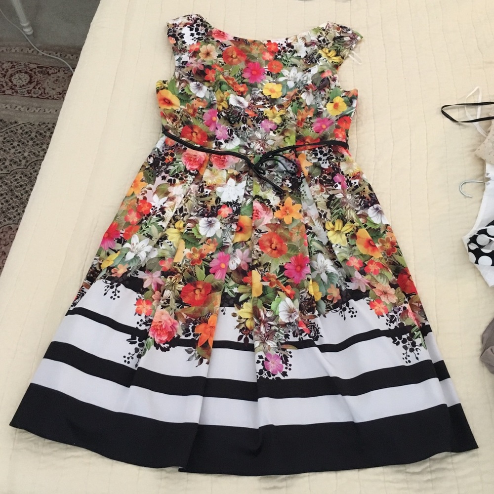 Début floral dress bought in the UK